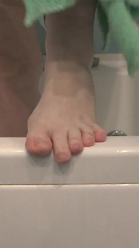 Key moment from &quot;Mature feet in soapy foam. Amateur foot fetish close-up. ASMR.&quot;