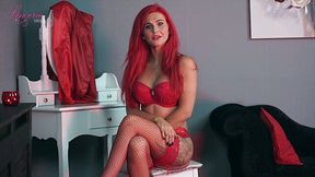 Sexually charged red haired woman Roxi K tells erotic stories in sexy lingerie