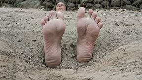 Buried on the beach with only my feet and head outside, my soles are tickled a lot (C3)
