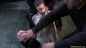 Blindfolded chained hoe is caned