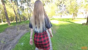 Naughty girl in miniskirt no panties flashing in the park (public upskirt)