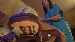 Lesbian masseuse fucks a sexy blonde client with a strapon