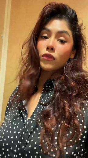 Woman in polka dot shirt