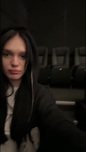 Woman in a theater