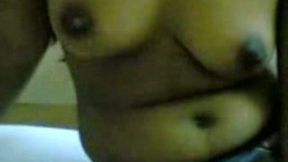 Cute Indian hot housewife with big tits poses naked on cam