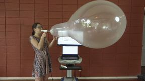 Anastasia Blows Several Round Balloons to Bursting (MP4 - 720p)