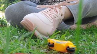 Giantess with big sweaty feet crushes toy cars and smashes them all
