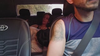 Ride-hailing driver picks up lesbian couple at party.