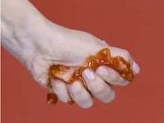 A squeezing tomato