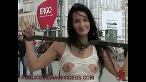 Shackled beauty flashing in public
