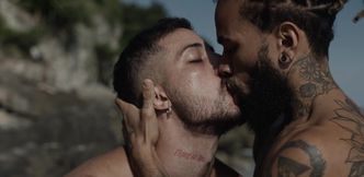 Appealing men make out in outdoor group sex by the beach