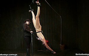 Redhead in inverted bondage tormented