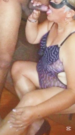 Mature milf giving a good cock sucking to her young lover