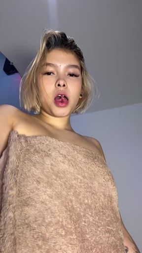 Short-haired teen with a tongue fetish explores her desires