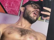 sexy latino from Medellin with big cock masturbates in front of the mirror for his fans