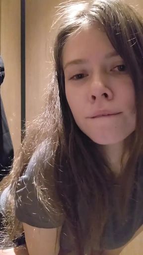 Charming girl teases you very quietly in a public toilet