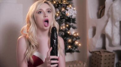 Christmas dildo stretches her wet pink pussy