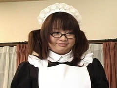 Japanese maid in uniform licking and humming a stiff baton