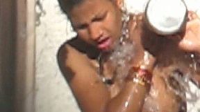 Hot and chunky seductive Indian lady open air showering