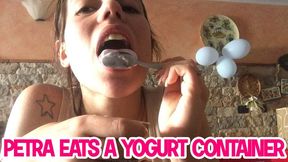 Petra eats a yogurt container - HD