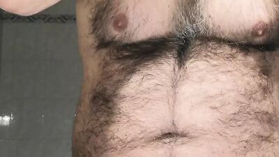 I'm in the bathroom shaving and jerking my cock.