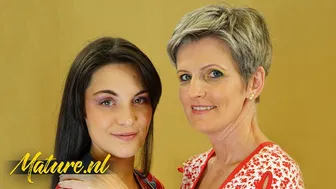 Mature woman seduces a young lesbian babe with passionate play