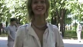 Marvelous slender blonde teen flashes her perky breasts and booty