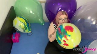 German BBW looner Abby Strange filling a bed with balloons