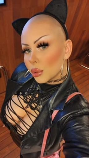Bald Catgirl In Latex Dress