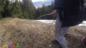 While hiking in the mountains I had to piss, then I jerked my cock with pleasure