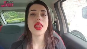 Good looking Petra smoking in her car