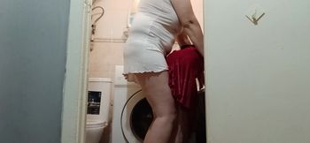 While my husband is at work, I fuck my neighbor with a strap-on