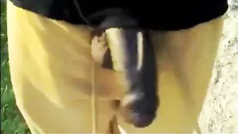 Black amateur with big cock jerks off outdoors