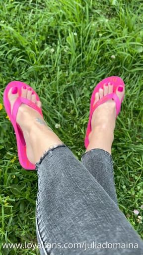 My new pink flip flops and my feet with pink toenails polish