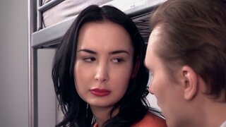 Dirty brunette blows a horny stranger in the hostel room