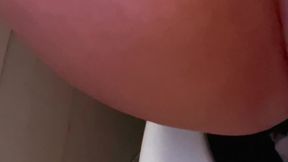 Pissing on airplane bathroom