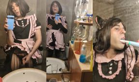 Maid washing her teets while gushing golden shower on mirror