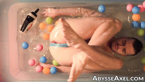 Wet Axel Abysse lift his booty so that you can see his perfect rosebud in it