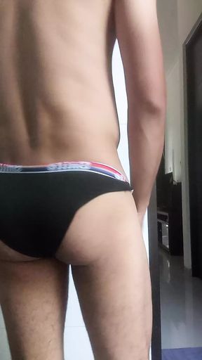 Sexy asian guy shows off her round naked tiny ass without a single thread in the bathroom having fun