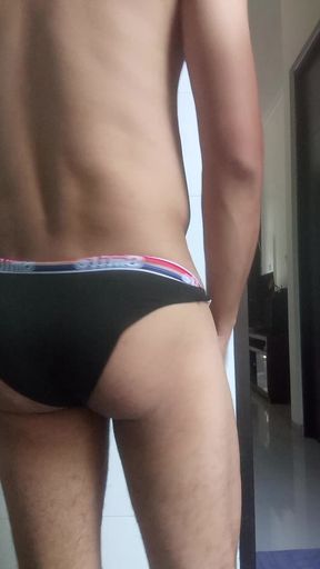 Sexy asian guy shows off her round naked tiny ass without a single thread in the bathroom having fun