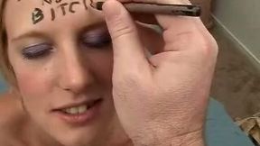 Disgraceful blondie with dirty words on her forehead blows dick
