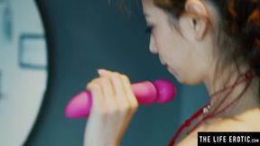 Sensuous Asian girl climaxes in clear glass &mdash;  sips the