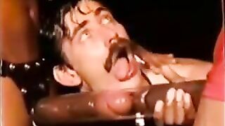 Vintage interracial blowjob and handjob with a pumped-up cock