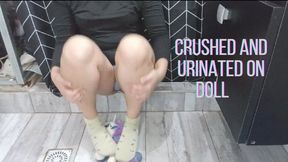 Lola crushes and urinates on her doll