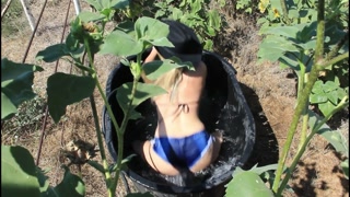 Country girl gets down and wet on the farm