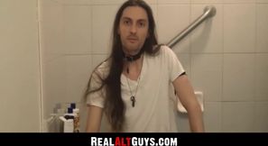 RealAltGuys.com - Long-haired stud strokes his cock intensely while relaxing in the b