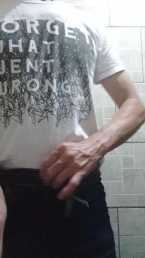 A handjob in the bathroom