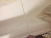 Russian guy pissing in the bath closeup