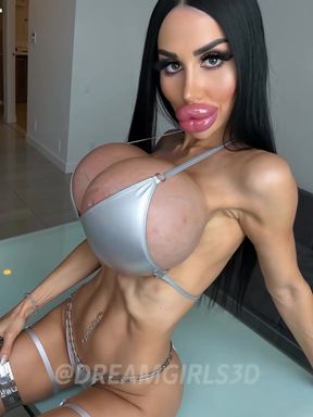 Blonde bimbo with fake boobs flaunts her big fake lips