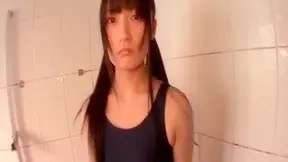 Pigtailed japanese angel with big ass is washing her cave